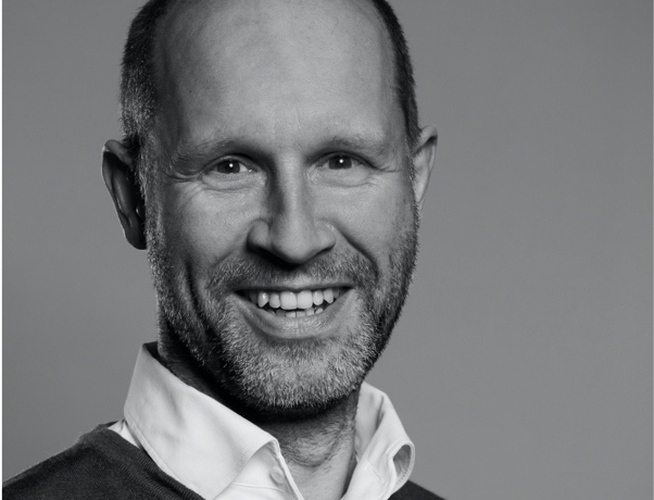 Close-up photo of Armando Voets, professional with over 20 years of experience in the telco industry. A digital e-commerce platform initiator and multi-country product management and innovation orchestrator